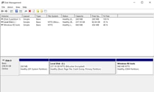 Windows 10 Home’s disk management shows the hard drive as BitLocker Encrypted.