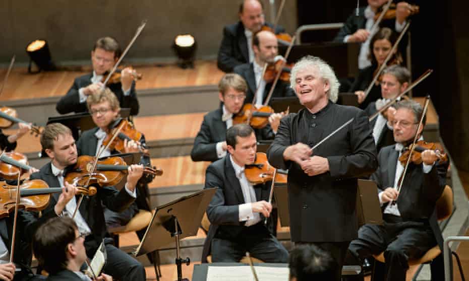 Liverpudlian Sir Simon Rattle conducts the Berlin Philharmonic.