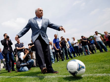 Who was the first American to play football for a major European team? | The Knowledge Sepp Blatter kicks a ball.