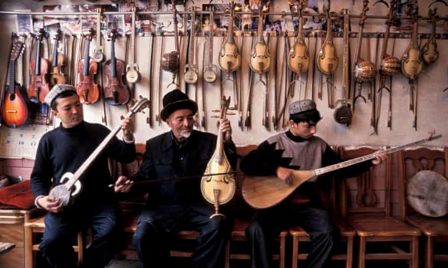 Traditional Uigar musicians in a shop in Kashgar city.
