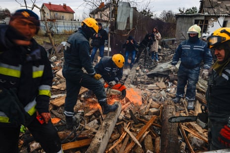 Debris cleaning works after missile attacks hit Kyiv.