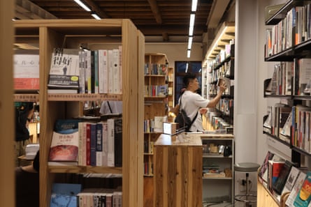 A man browses inside a bookshop