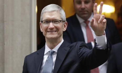 Apple boss Tim Cook waving