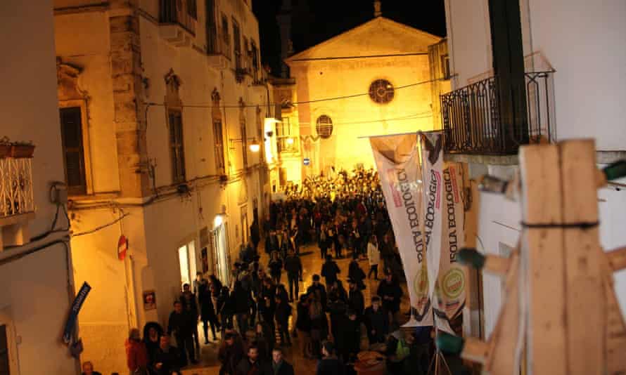 Visitors revel in the foodie streets at Bacco nelle Gnostre, Noci, Italy.