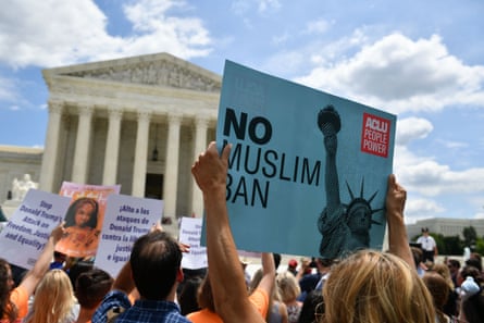 People protest Trump’s travel ban outside of the US Supreme Court in Washington, DC in 2018.