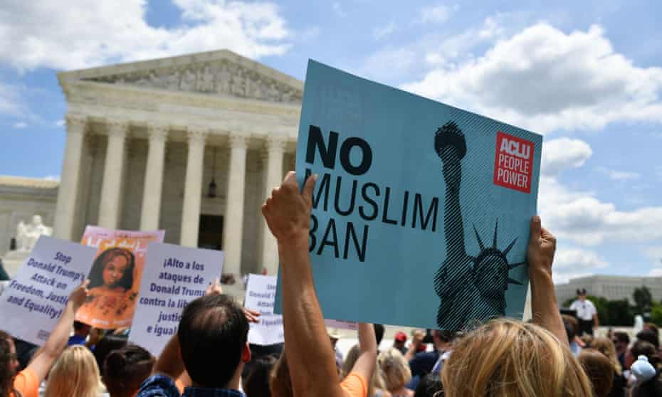 People protest the travel ban outside the US supreme court in Washington in June 2018.