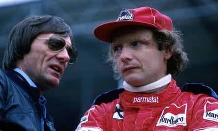 Bernie Ecclestone looking at Niki Lauda