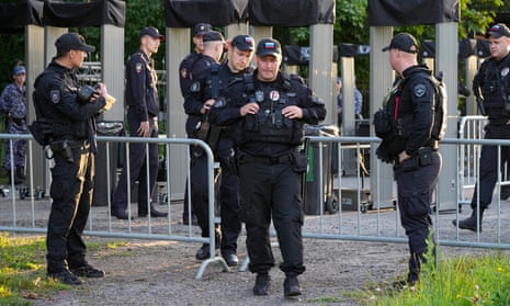 Police guard at the entrance of the Porokhovskoye cemetery in St. Petersburg, Russia, Tuesday, 29 August 2023 after a memorial service for mercenary chief Yevgeny Prigozhin, who was killed in a plane crash last week amid Russia’s war in Ukraine.