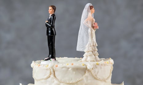 Figures of couples on a wedding cake