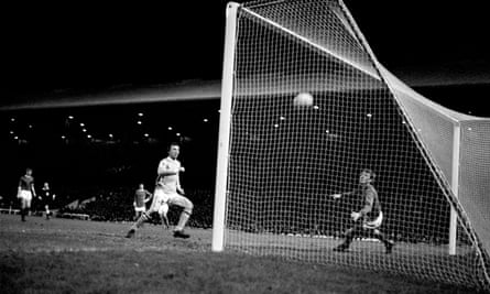 Manchester City’s Mike Summerbee scores the winner on aggregate past Alex Stepney in the 1969 semi-final second leg at Old Trafford.