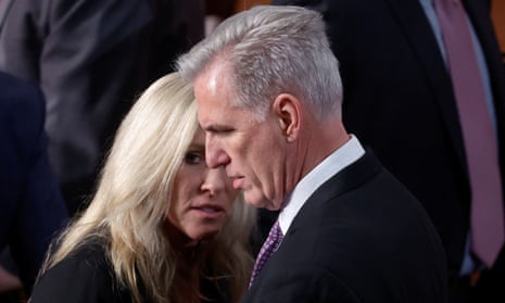 Kevin McCarthy and Marjorie Taylor Greene on the floor of the US House.