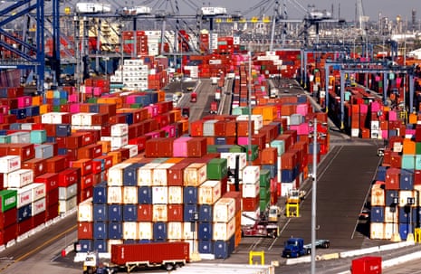 Shipping containers are stacked at the Port of Los Angeles in San Pedro, California.