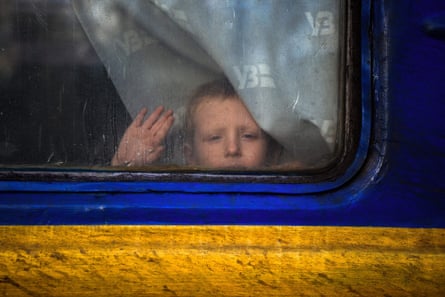 A child on an evacuation train in Pokrovsk in eastern Ukraine, November 2022