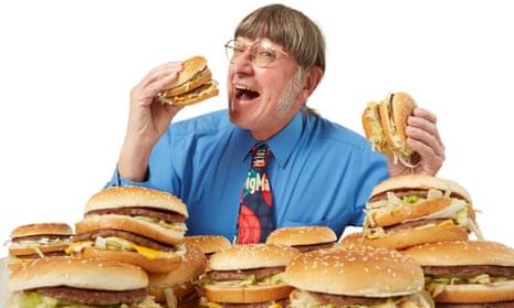 Don Gorske surrounded by Big Macs in 2021.