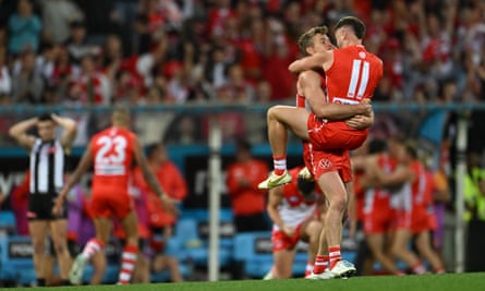 Tom Papley and Luke Parker celebrate after the siren at the SCG.