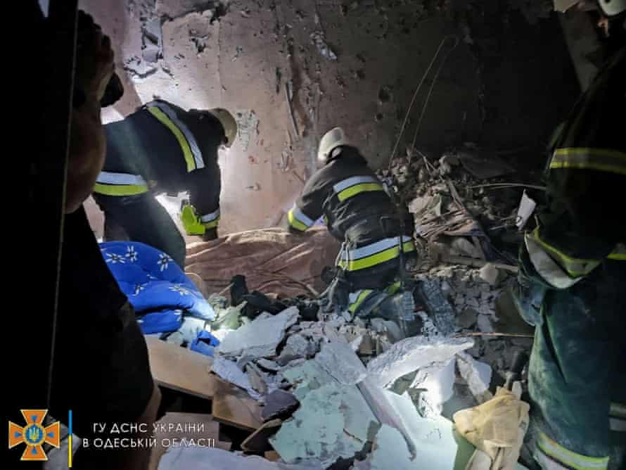 Ukraine’s state emergency services have issued this handout picture of rescue workers in Odesa.