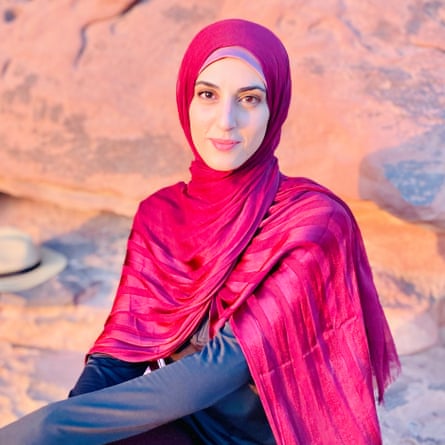 a women looking at a camera