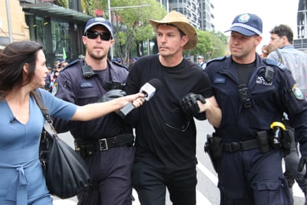 Former Greens senator Scott Ludlam is arrested at an Extinction Rebellion protest in Sydney on 7 October. His bail conditions prevent him from coming within 2km of the Sydney CBD.
