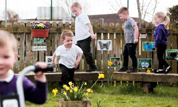 children playing outside at a nursery school