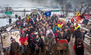 Dakota Access Pipeline water protectors march in South Dakota.