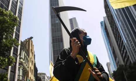 A demonstrator dressed as the Grim Reaper protesting earlier this month against the president, Jair Bolsonaro’s, handling of the Covid pandemic.  