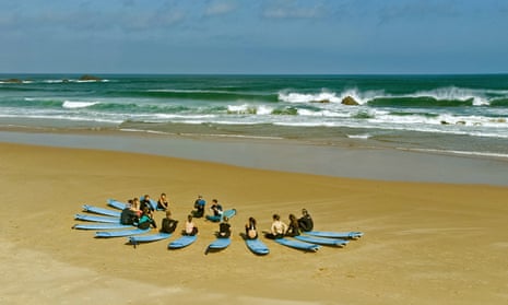 A surfing and yoga retreat in the Algarve is among the holidays to be auctioned.