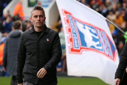 Kieran McKenna walking during his time in charge at Ipswich