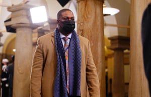 Eugene Goodman, a Capitol police officer, was seen rushing Senator Mitt Romney to safety in a dramatic video.