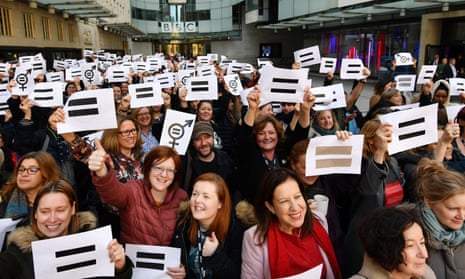 BBC employees gather outside Broadcasting House in London, to highlight equal pay on International Women’s Day