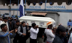 Friends and supporters carry the coffin of slain environmental rights activist Berta Caceres along the streets of La Esperanza.