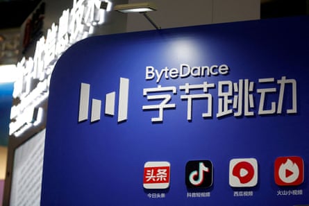 The ByteDance logo is seen on a blue background along with the logos of TikTok and other platforms owned by ByteDance during a media tour.