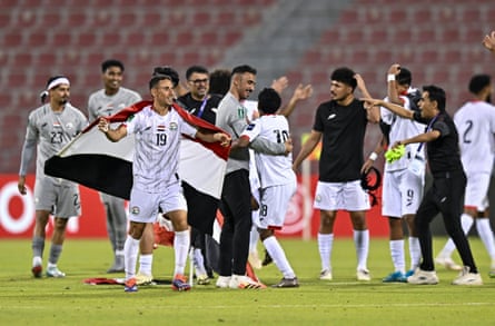 Yemen players celebrate after winning the Asian Cup qualifiers match against Lebanon