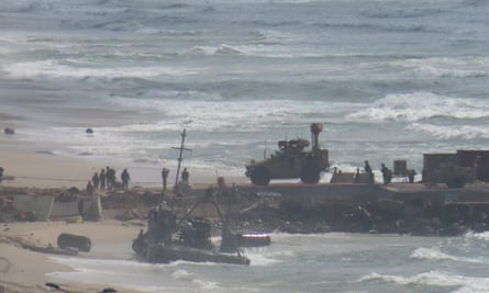 A view of the floating pier, set up by the US to facilitate delivery of humanitarian aid to Palestinians, after it was suspended due to adverse weather conditions and rising sea levels in Gaza City on 27 May.