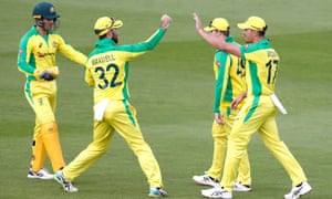 Australia’s Marcus Stoinis (right) celebrates with team-mates after catching out England’s Dawid Malan.