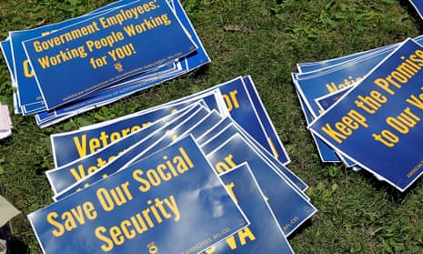 Signs on the ground during a rally of federal employees to protest proposed cuts in federal funding in Philadelphia, Pennsylvania, on 22 June 2017. 