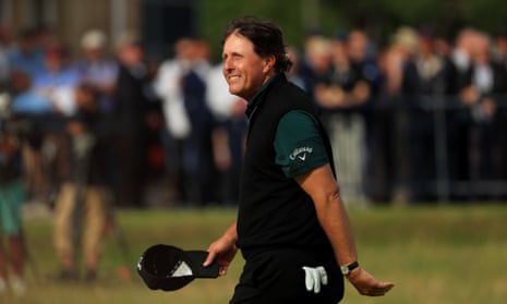 Phil Mickelson smiles as he finishes his leading round of 63.