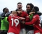 Benjamin Sesko is mobbed by his Manchester United teammates after scoring a dramatic winner against Fulham.