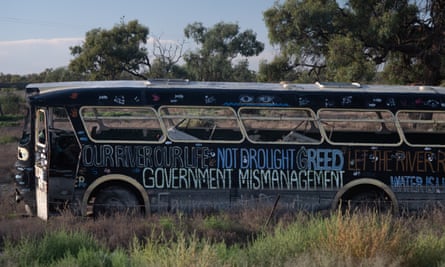 A gratified bus at Menindee on the Darling-Baaka River in 2019, after mass fish kills in which a million native fish died.