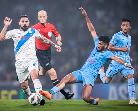 Mumbai City’s Mehtab Singh tackles Rúben Neves of Al-Hilal during their AFC Champions League group match in 2023.