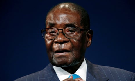 Robert Mugabe leaves the stage after participating in a discussion at the World Economic Forum on Africa in Durban in May.