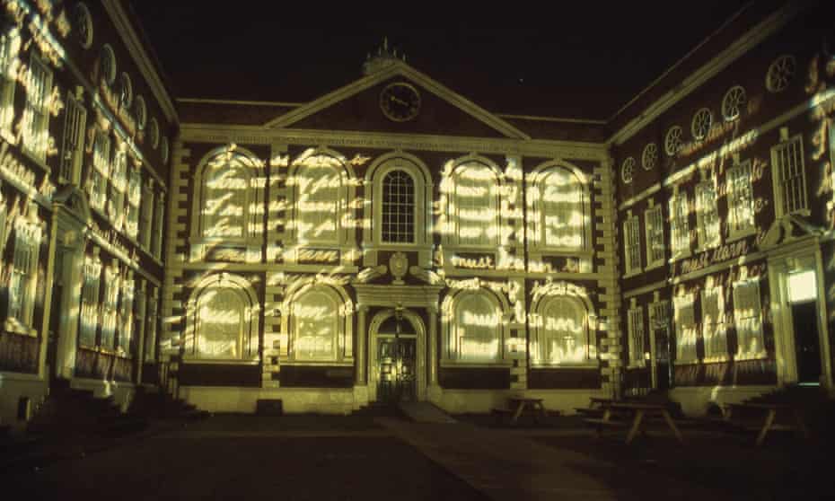'I Must Learn to Know My Place' projected on building's facade
