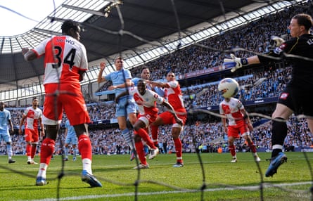 Edin Dzeko scores the equaliser for Manchester City against QPR in 2012.