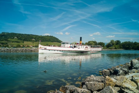 Old steamboat on a lake in lovely countryside