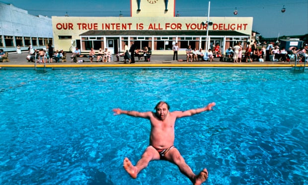 Man dives backwards into pool