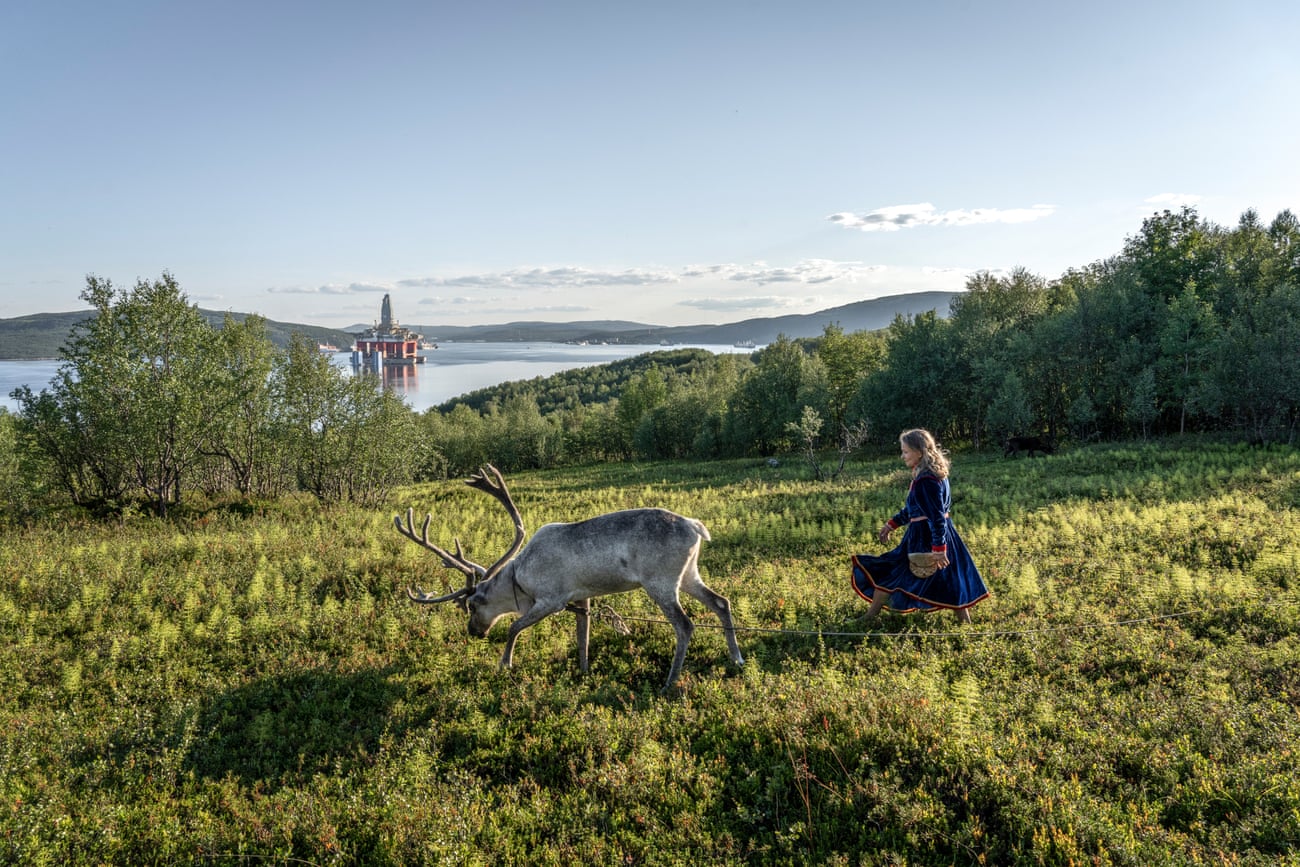 Elena Yakovleva, Uliana’s aunt, walks her reindeer along Kola Bay near her Sami mini-village, which she has reconstructed for tourists