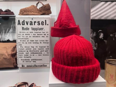 An exhibit of red knit hats in Norway’s Resistance Museum