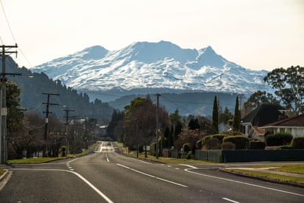 Empty street in Ohakune, New Zealand in winter, with Mt Ruapehu and the Turoa ski field in the background.