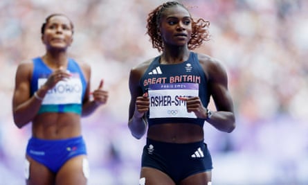 Dina Asher-Smith of Britain reacts after finishing second place in heat five