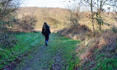 A woman walking in Snipe Dales Nature Reserve,