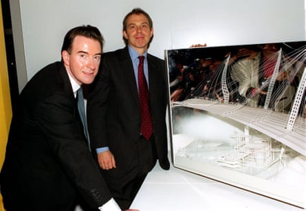 Mandelson (left) and Tony Blair posing for photo with dome model on a table